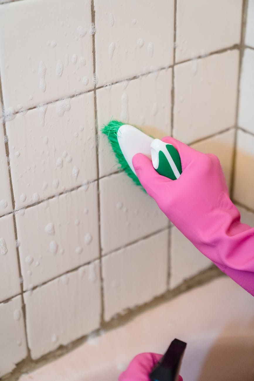 close up of brushing the wall tiles